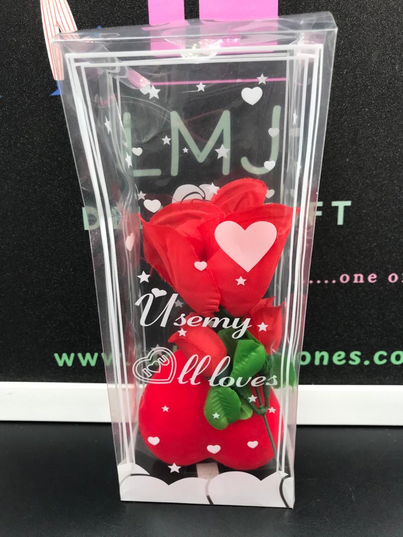 Red roses love shaped wrapped in plastic